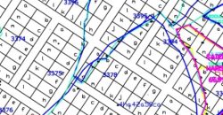 Parcelle de 400 m² sur 2 Voies et Rond-Point