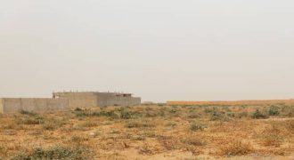 Parcelle de 400 m²  sur une Voie de 20 m
