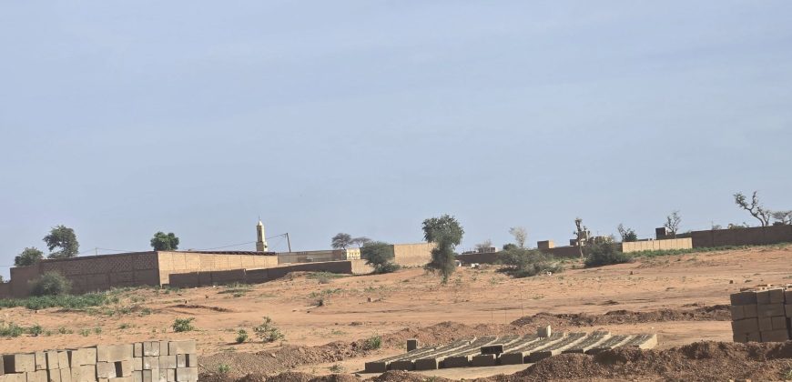 Terrain Urbain de 400 m², Constructions aux alentours