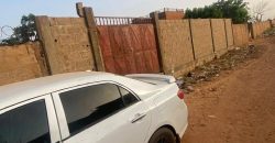 Parcelle Clôturée avec Grande Porte, sur 300m²