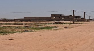 Parcelle de 400 m² sur 2 Voies, Est du mur de l’Université
